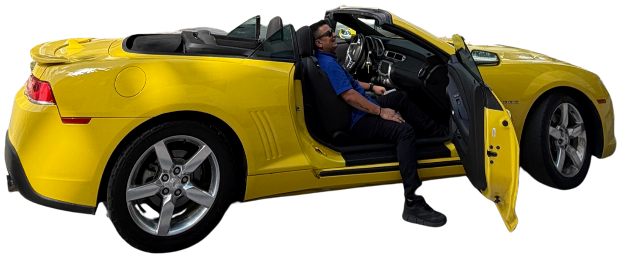 Jhon from BCG in a yellow Camaro